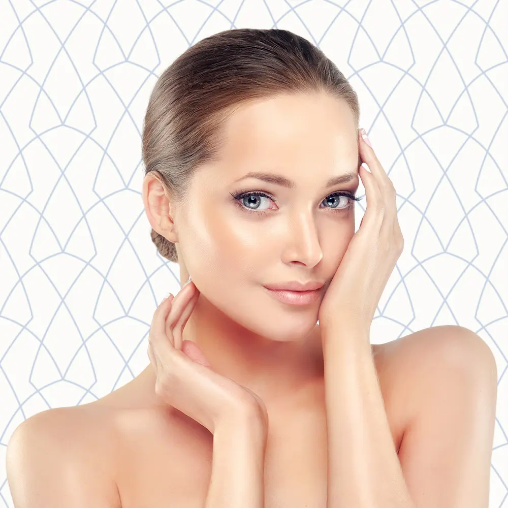 Young Woman Posing with a Hand on Her Face | Facials | Andromeda Medspa