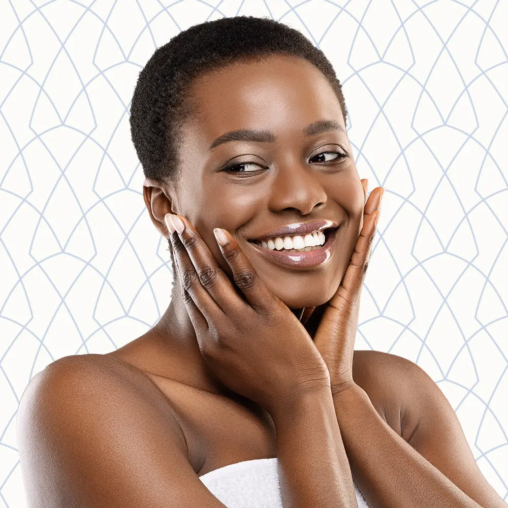Young and Beautiful African American Woman Smiling | Facials | Andromeda Medspa
